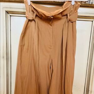 Sugar+Lips tan, wide legged, high waisted, cropped pants.